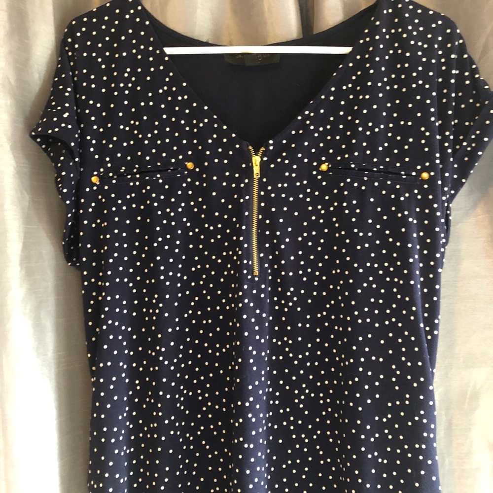 Navy blue and white polka dot top